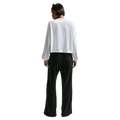 Back view of the Nike Sportswear Chill Terry Crew Neck in Birch Heather colourway, women model