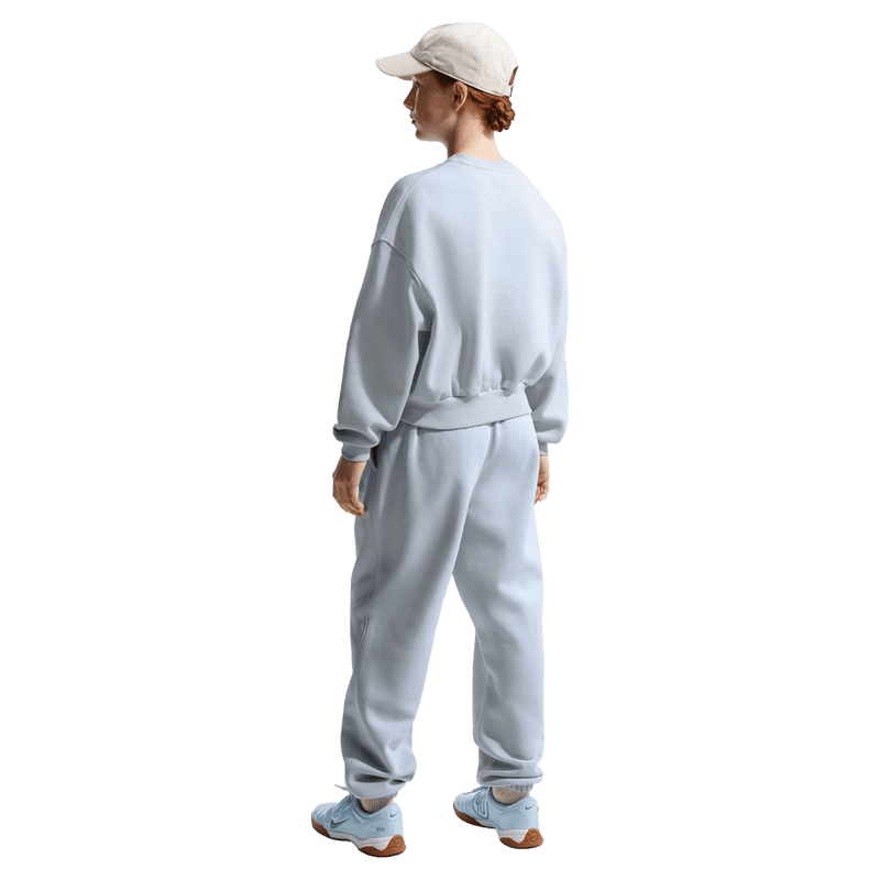 Back view of the Nike Sportswear Club Fleece Crew Neck in Ghost colourway, kids model