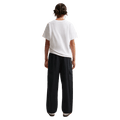 Back view of the Nike Sportswear Club Woven Cargo Pants in Black and White colourway, kids model