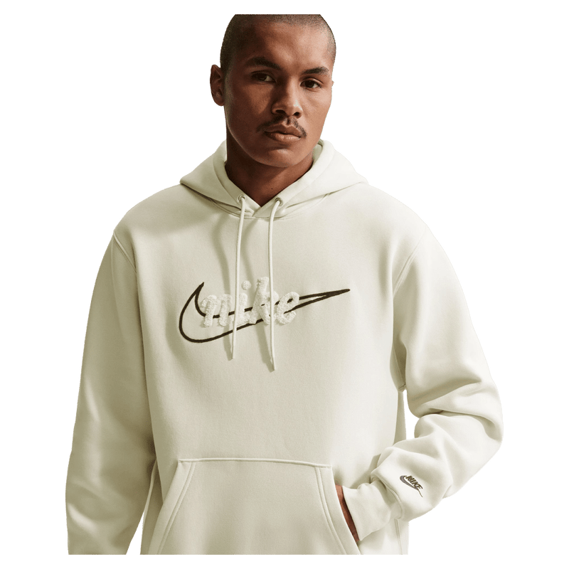 Main view of the Nike Sportswear Club Hoodie in Light Khaki colourway, unisex model