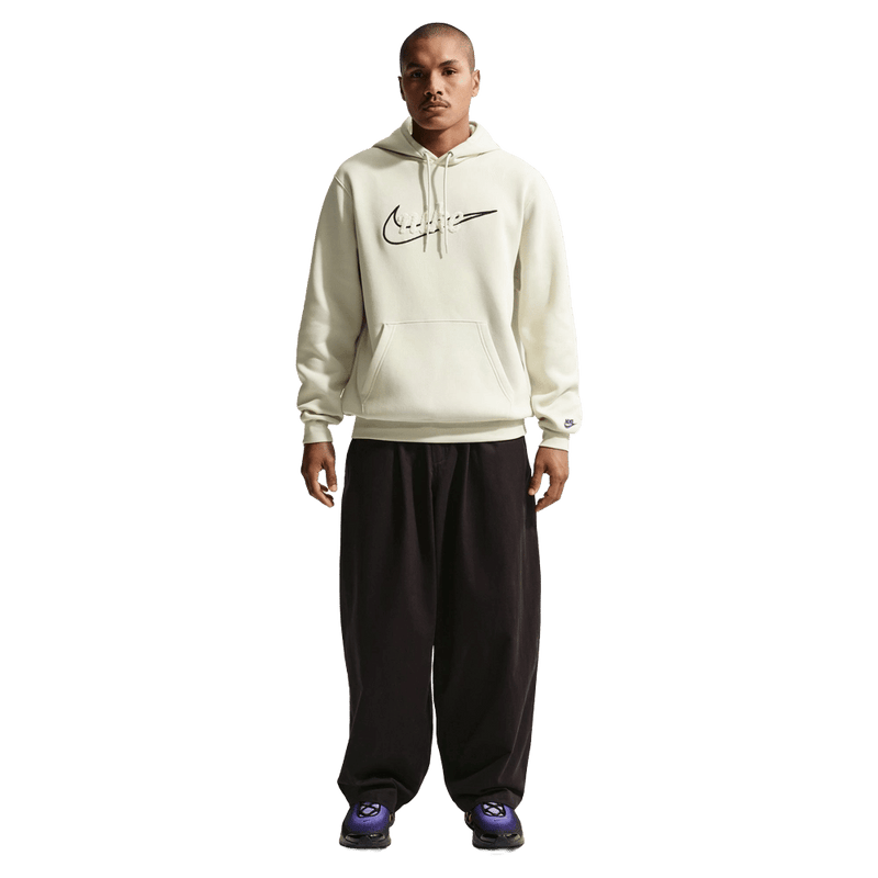 Front view of the Nike Sportswear Club Hoodie in Light Khaki colourway, unisex model