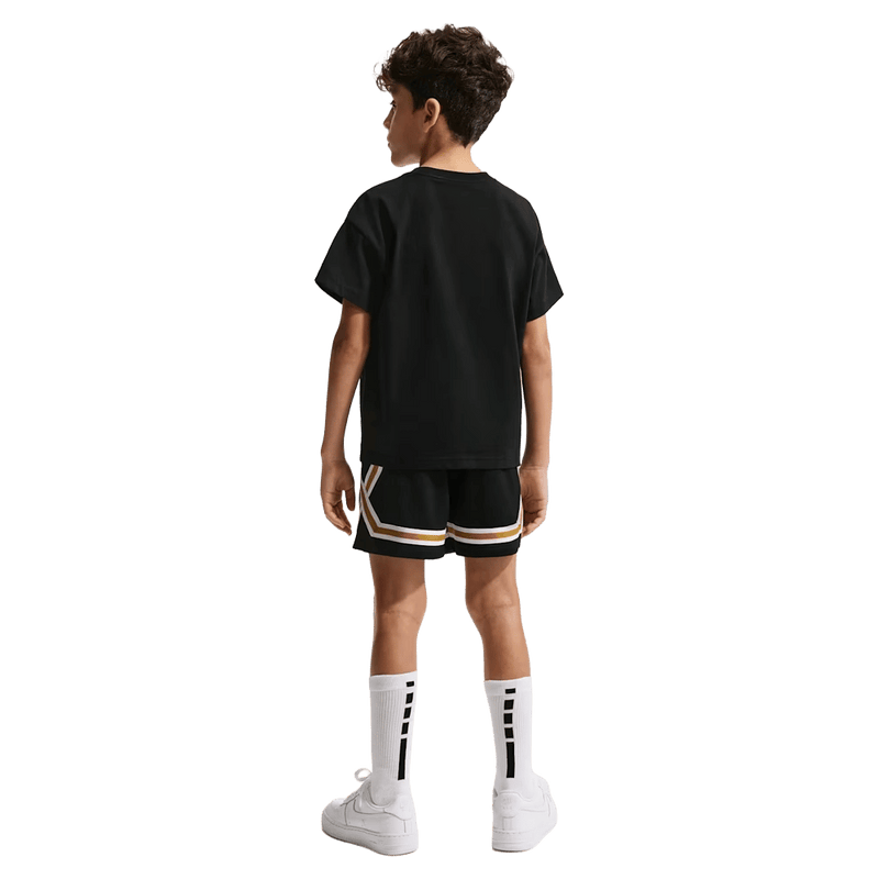 Back view of the Nike Sportswear Tee in Black colourway, kids model
