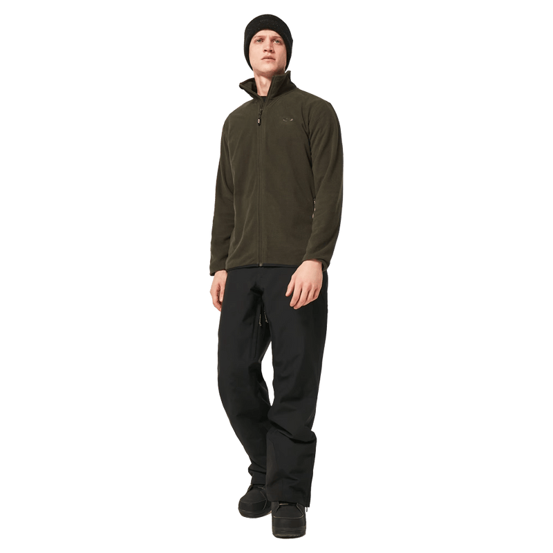 Full-body view of the Oakley Best Cedar Rc Insulated Ski Pants in Blackout colourway, mens's model