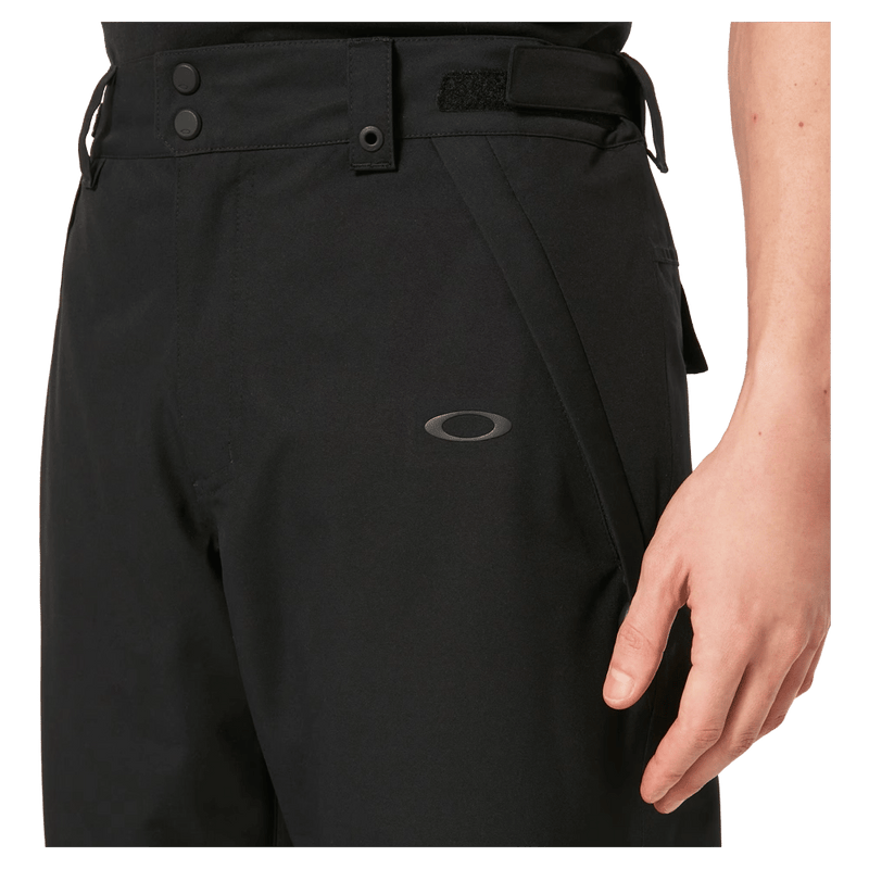Detail view of the Oakley Best Cedar Rc Insulated Ski Pants in Blackout colourway, mens's model