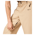 Detail view of the Oakley Best Cedar Rc Insulated Ski Pants in Pebble colourway, mens's model