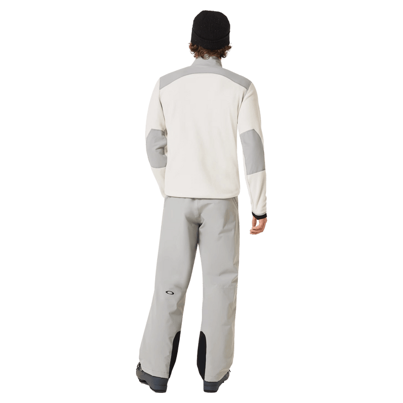 Back view of the Oakley Butter Tech Fleece in Mist and Cement colourway, men's model