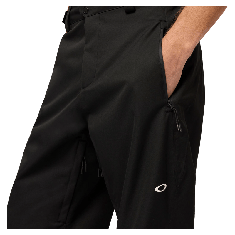Pockets view of the Oakley Kendall Rc Shell Ski Pants in Black and White colourway, men's model