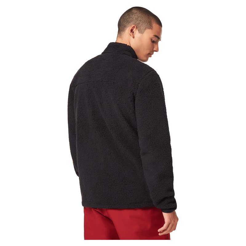Back view of the Oakley Mountain Fire Sherpa Jumper in Blackout colourway, unisex's model