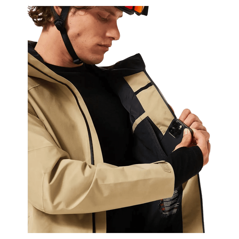 Inside pockets view of the Oakley Unbound Gore-Tex Shell 2.0 Ski Jacket in Pebble colourway, men's model