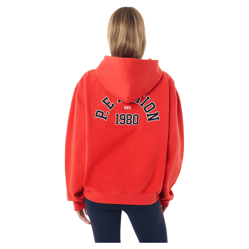 Back view of the P.E Nation Established Hoodie in College Red colourway, women model