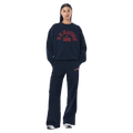 Full-body view of the P.E Nation Established Jumper in Dark Navy colourway, women model