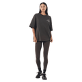 Full-body view of the P.E Nation Established Tee in Dark Olive colourway, women model