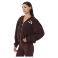 Side view of the PE NATION Established Zip Thru Hoodie Mahogany Jumper, 26/27 Womens's model
