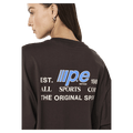 Back side view of the PE NATION Glide Oversized Tee Coffee Tee, 26/27 Womens's model