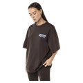 Side view of the PE NATION Glide Oversized Tee Coffee Tee, 26/27 Womens's model