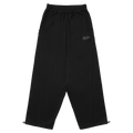 Black Resolve Daily Sweatpants with wide legs, elastic waistband, side pockets, and adjustable toggle hems.