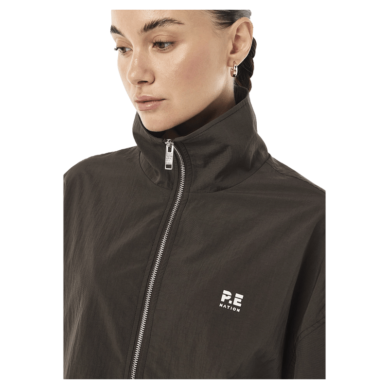 Close view of P.E Nation Radius Jacket - Womens in colour Coffee.