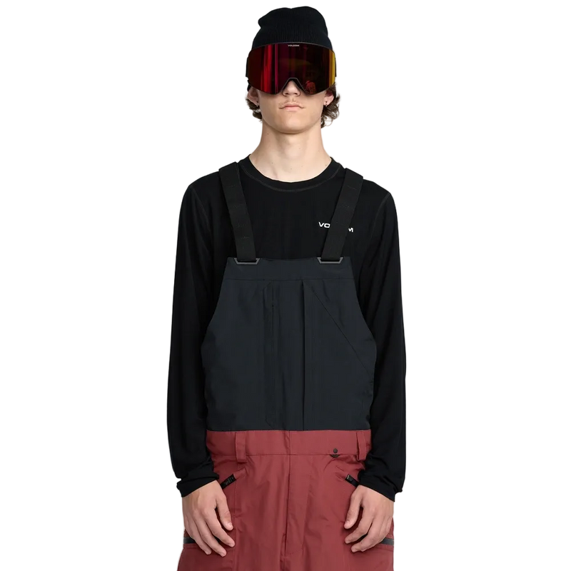 Front, on-body image of the Rain Gore-Tex Bib Snowboard Pants from Volcom in Burnt Red