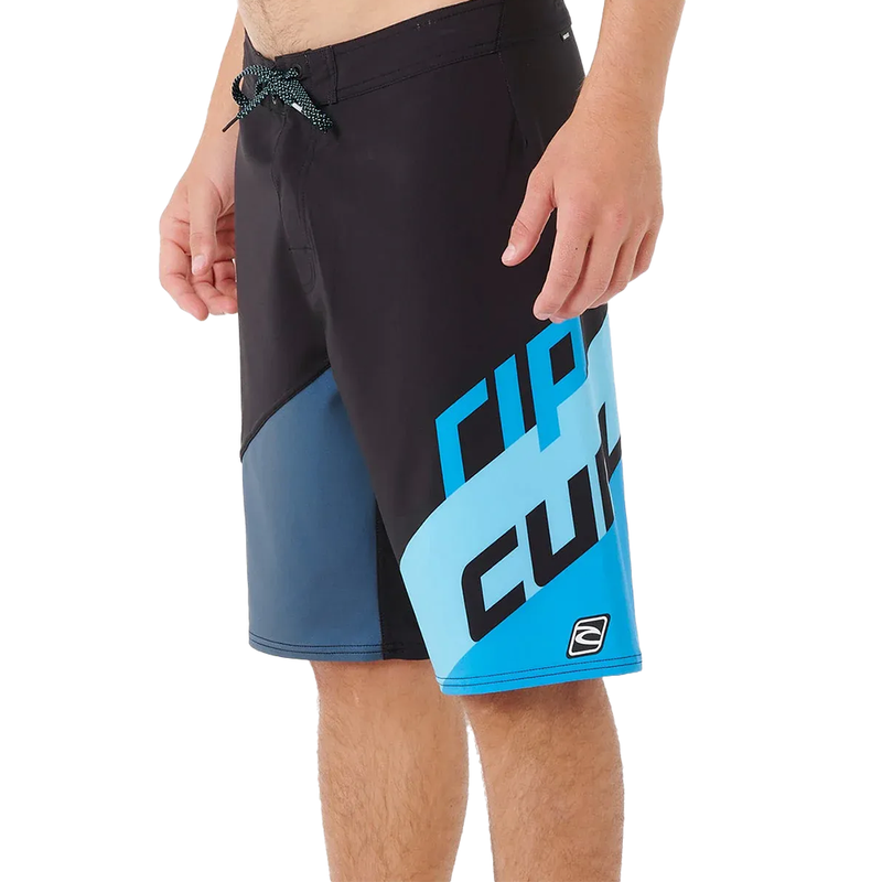 Side image of the Mirage Little Mali Boardshorts in Blue Black