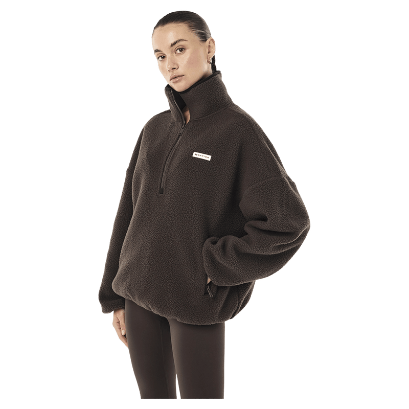 Side view of P.E Nation Rotate Quarter Zip - Womens in colour Coffee.