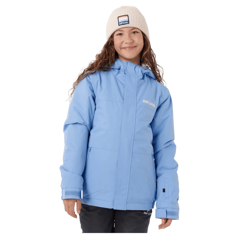 Child wearing a light blue Rip Curl Anti Series Olly hooded ski jacket with adjustable cuffs and a white beanie.