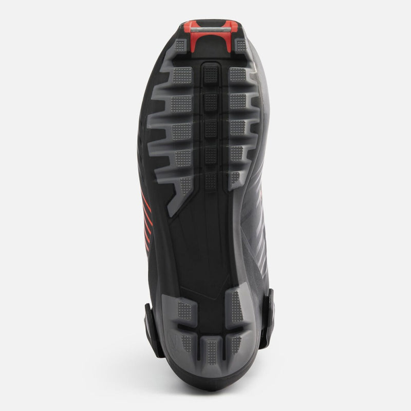 Bottom view of Rossignol X-9 Skate Boots showing the NNN Rottefella binding plate with black and grey texture and red toe bar.