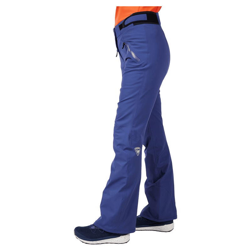 Side view of the Rossignol BLACKSIDE Pants in FUTURE BLUE colourway, women model