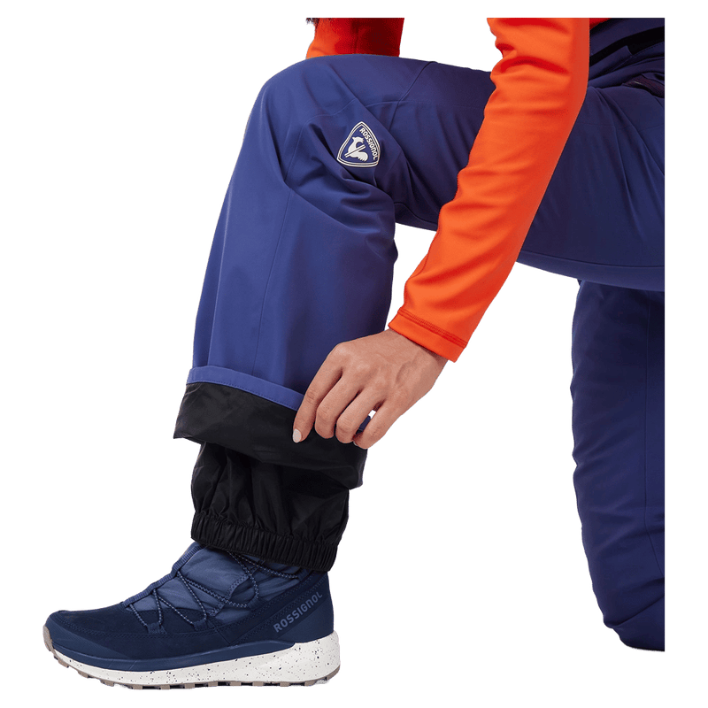 Gaiter view of the Rossignol BLACKSIDE Pants in FUTURE BLUE colourway, women model
