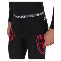 Waist view of the Rossignol Infini Compression Race Tights in Neon Red colourway, men model