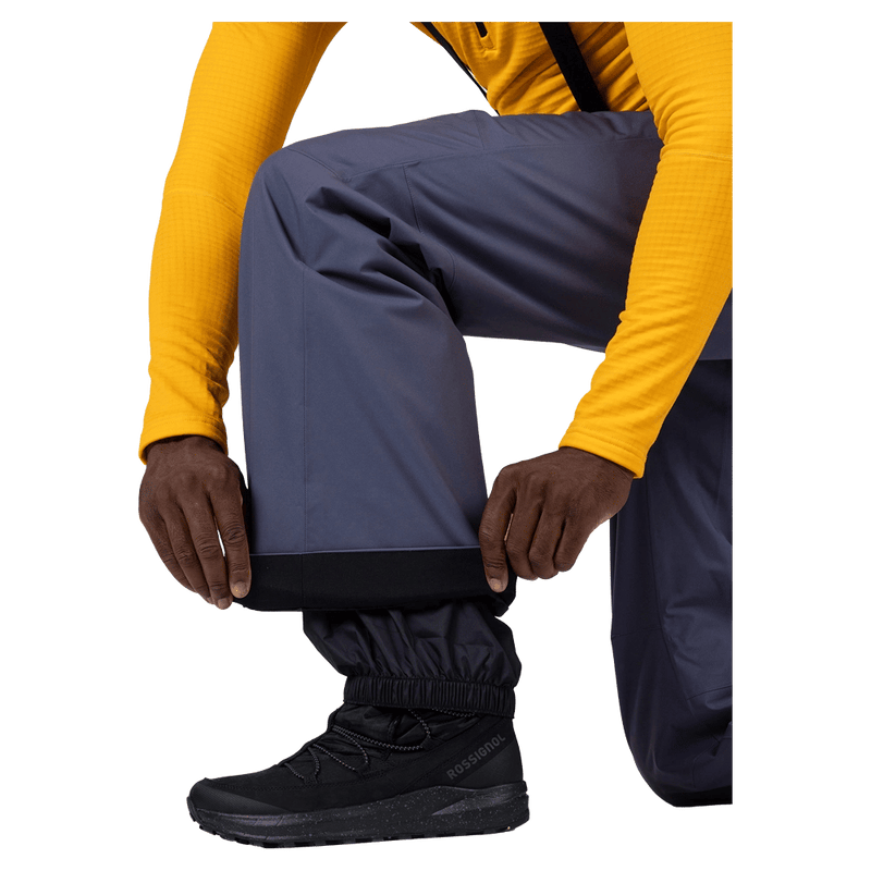Gaiter view of the Rossignol Insulated Ski Pants in TRUE NIGHT BLUE colourway, men model