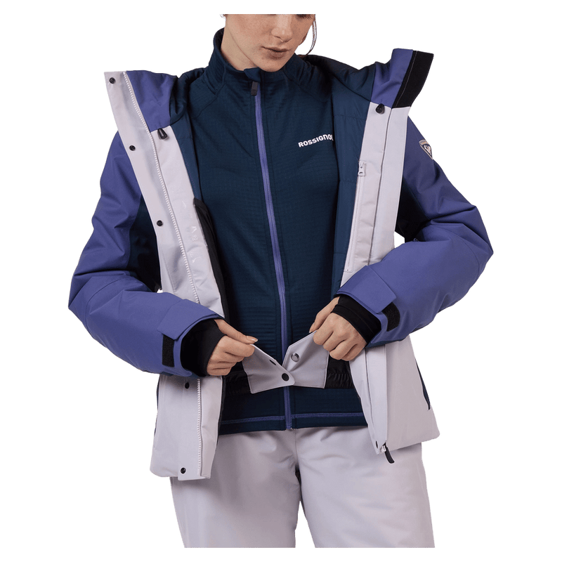 Powder skirt view of the Rossignol VELIKA INSULATED Jacket in GALACTIC LILAC colourway, women model