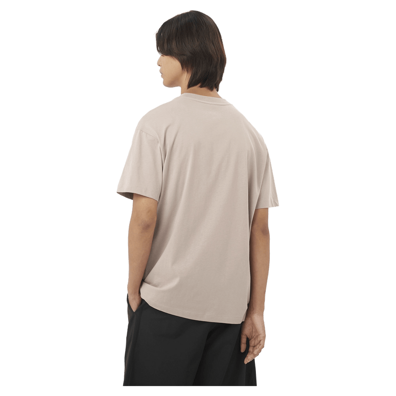 Back view of the Salomon Chest Logo Tee in Ethherea colourway, unisex model