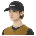 Worn view of the Salomon Trucker Cap in Deep Black colourway, unisex model