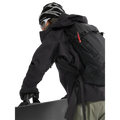 Detail view of a woman wearing the Sentinel Ski Jacket in Black featuring a zipepred pit vent.