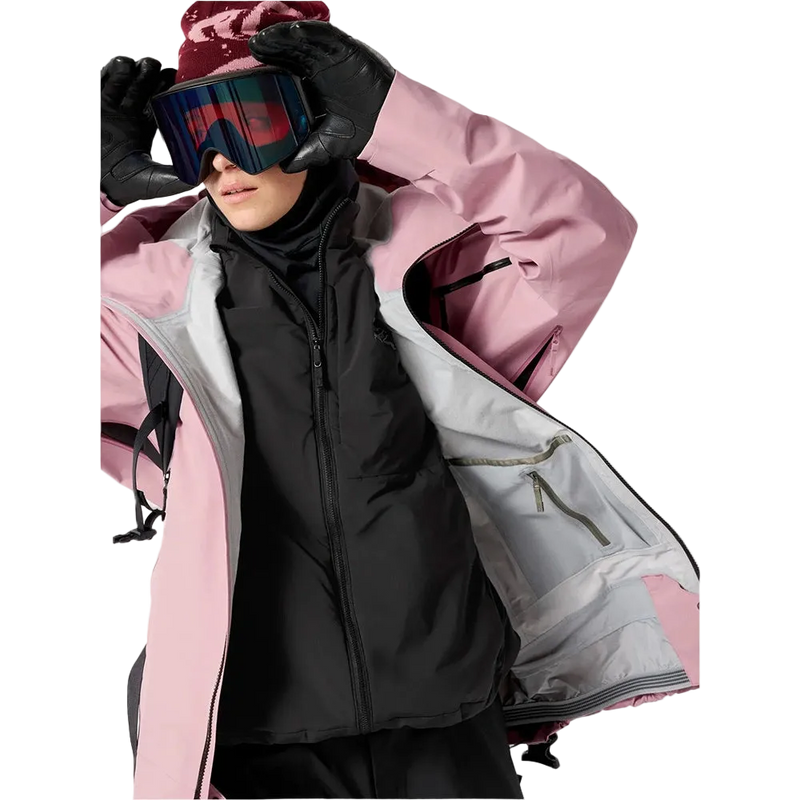 Detail view of a woman wearing the Sentinel Ski Jacket in Bliss Black.