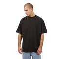 Man wearing Silent Theory Heavy Weight Tee in washed black