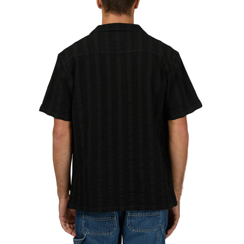 Back view of man wearing Luca SS Shirt in washed black colourway