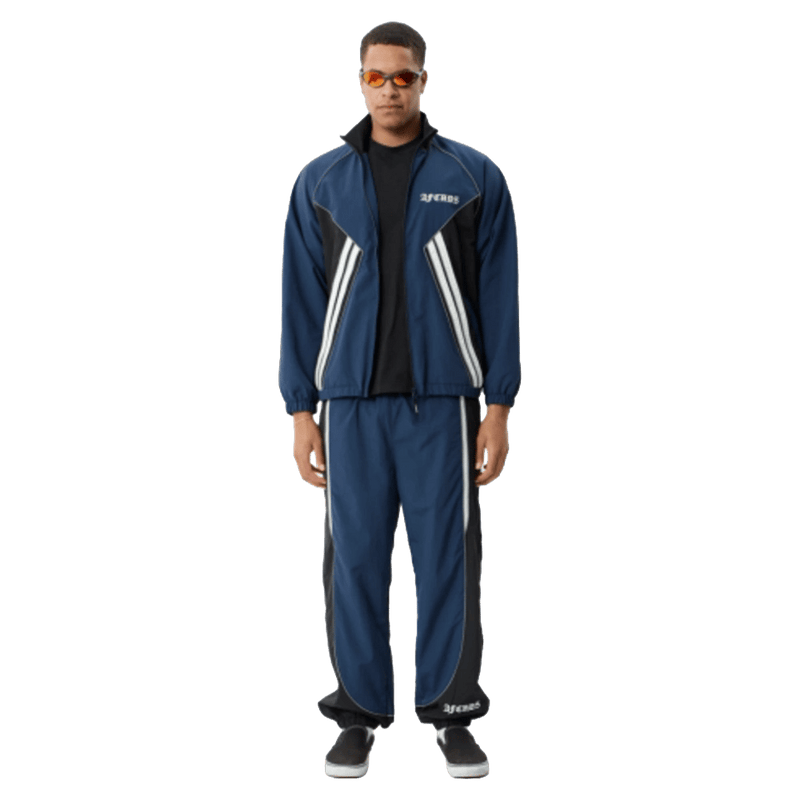 Front view of Afends Sporting Recycled Paneled Track Pants in colour Navy.