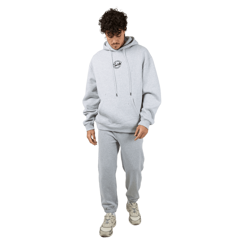 Full-body view of the St Goliath Radio Sweatpants in Grey Marle colourway, men's model