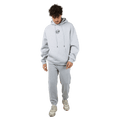 Full-body view of the St Goliath Radio Sweatpants in Grey Marle colourway, men's model