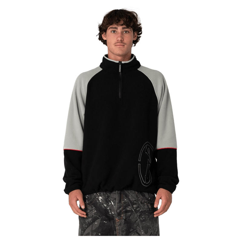 View of man in Rusty Tectonic Quarter Zip Polar Fleece in colour Black