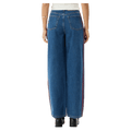 Back view of Afends Bella Stripe Denim Wide Leg Baggy Jean - Womens in colour Authentic Blue.