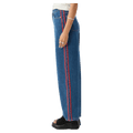 Side view of Afends Bella Stripe Denim Wide Leg Baggy Jean - Womens in colour Authentic Blue.
