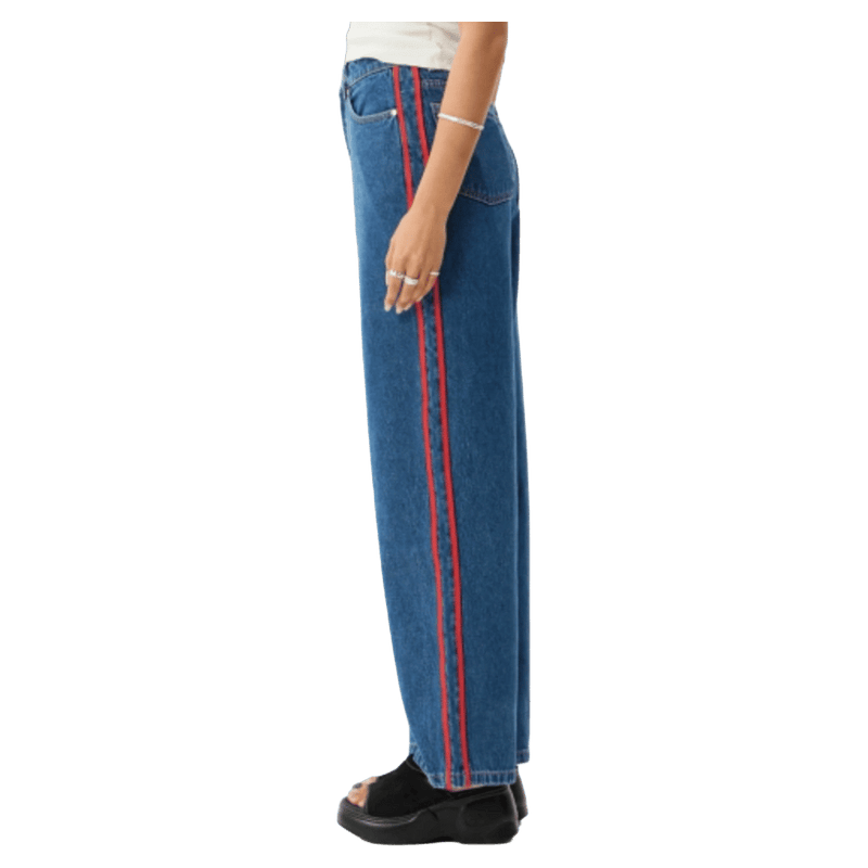 Side view of Afends Bella Stripe Denim Wide Leg Baggy Jean - Womens in colour Authentic Blue.