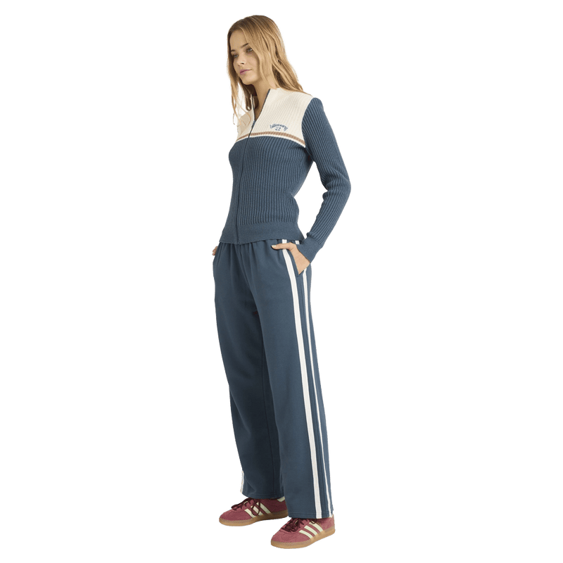 Side view of women wearing the Billabong Real Since 73 Trackpants - Womens in Stormy