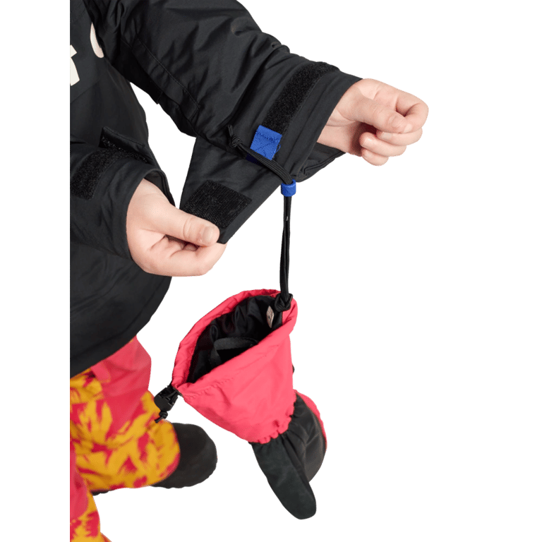 Kids' black Burton Frostner Anorak sleeve with adjustable Velcro cuff and red mitten attached by a leash cord.