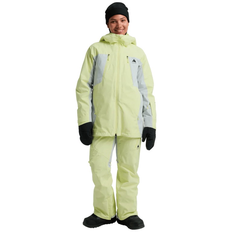 Women's Burton Reserve 3-In-1 Snowboard Jacket in light lime green and grey with hood and zippered chest pockets.