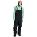 Black Burton Reserve Gore-Tex Bib Snowboard Pants with adjustable straps and chest pocket on a model.