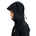 Side profile of a black Burton Reserve Insulated Snowboard Jacket for women with the adjustable hood up.