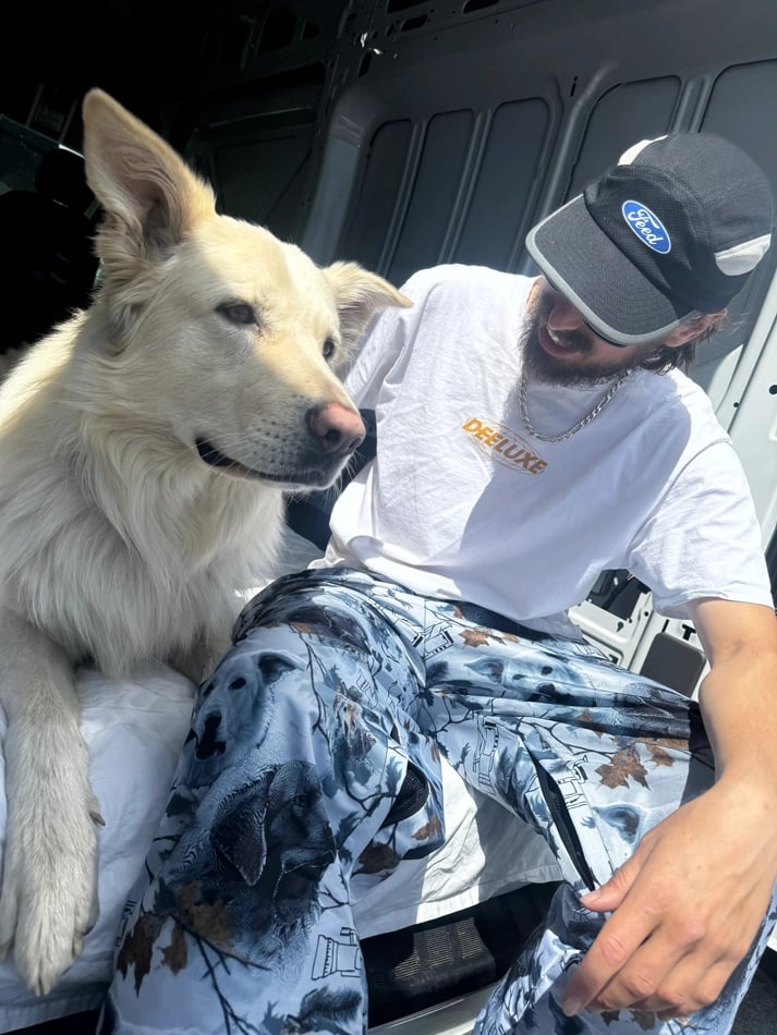 Dog3 view of the CHECKthefeed VX Classic Snowboard Pants - Dog Snow Camo Print CTF-VXCLASSICPANTSDOG Pants, 26/27 Unisex's model